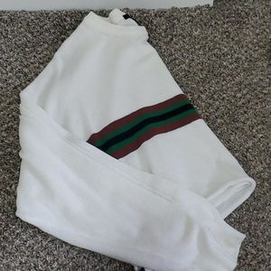 Cropped long sleeve sweater